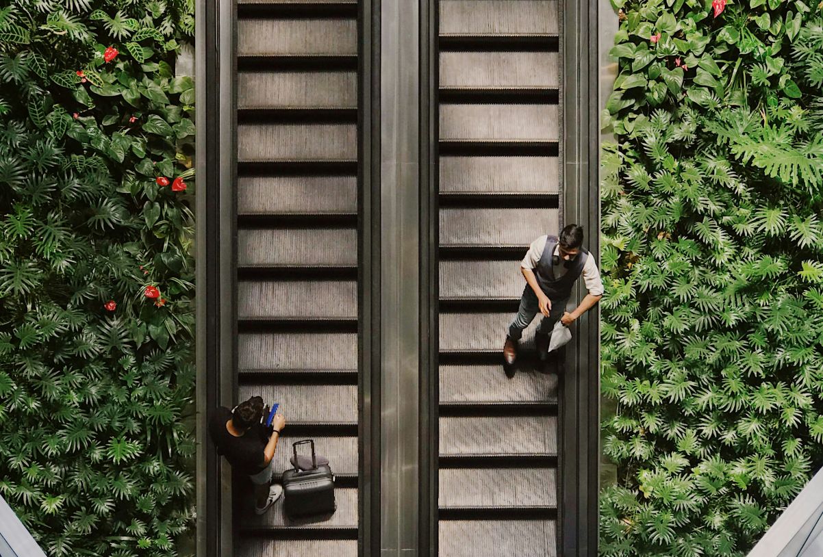 Aerial view of people on escalator